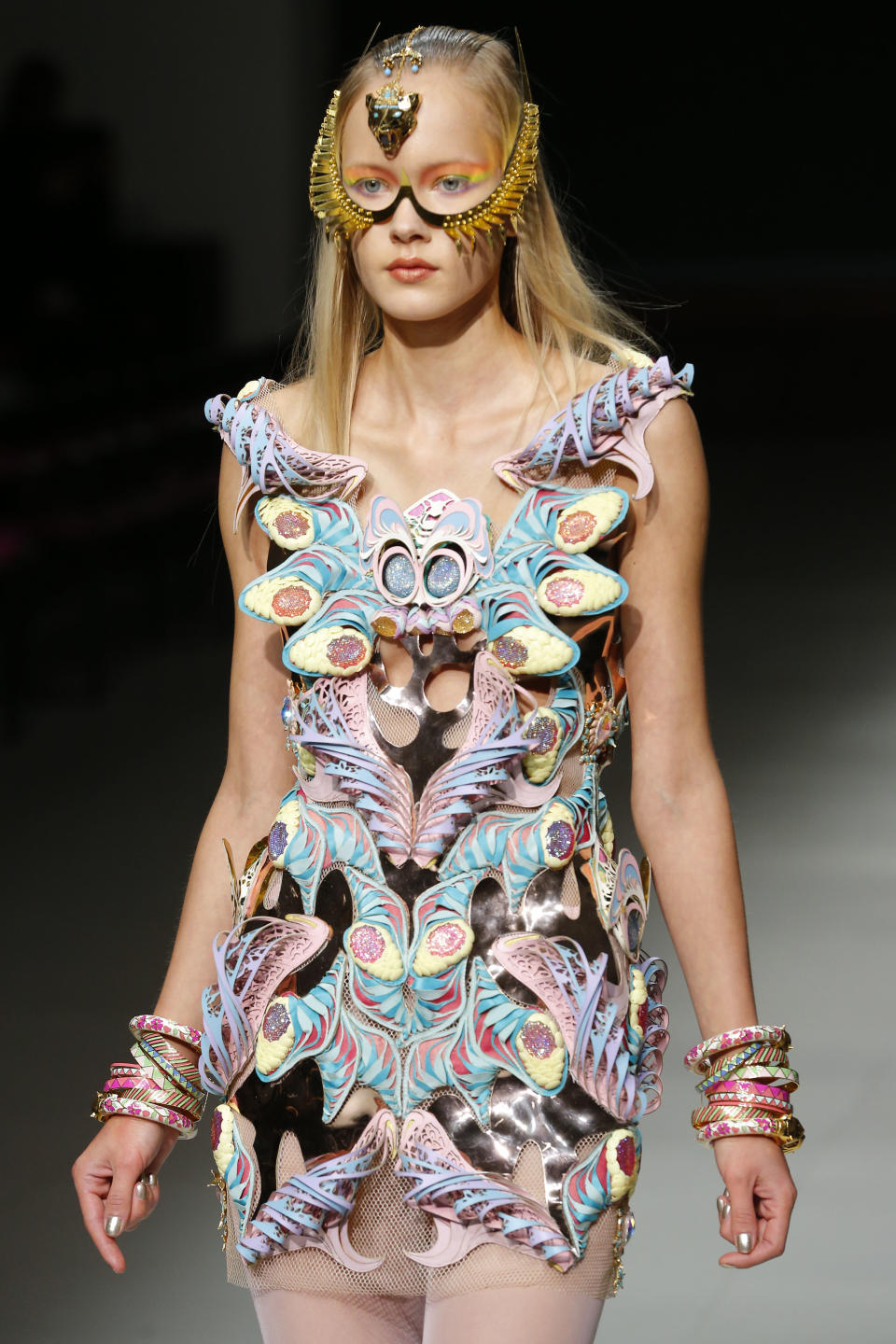 A model wears a creation for Indian fashion designer Manish Arora's ready to wear Spring-Summer 2013 collection, presented in Paris, Thursday, Sept.27, 2012. (AP Photo/Jacques Brinon)