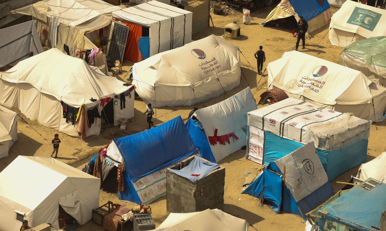 <span>Displaced Palestinians in makeshift tents in the Rafah refugee camp in southern Gaza, on 6 March 2024.</span><span>Photograph: Ismael Mohamad/UPI/REX/Shutterstock</span>