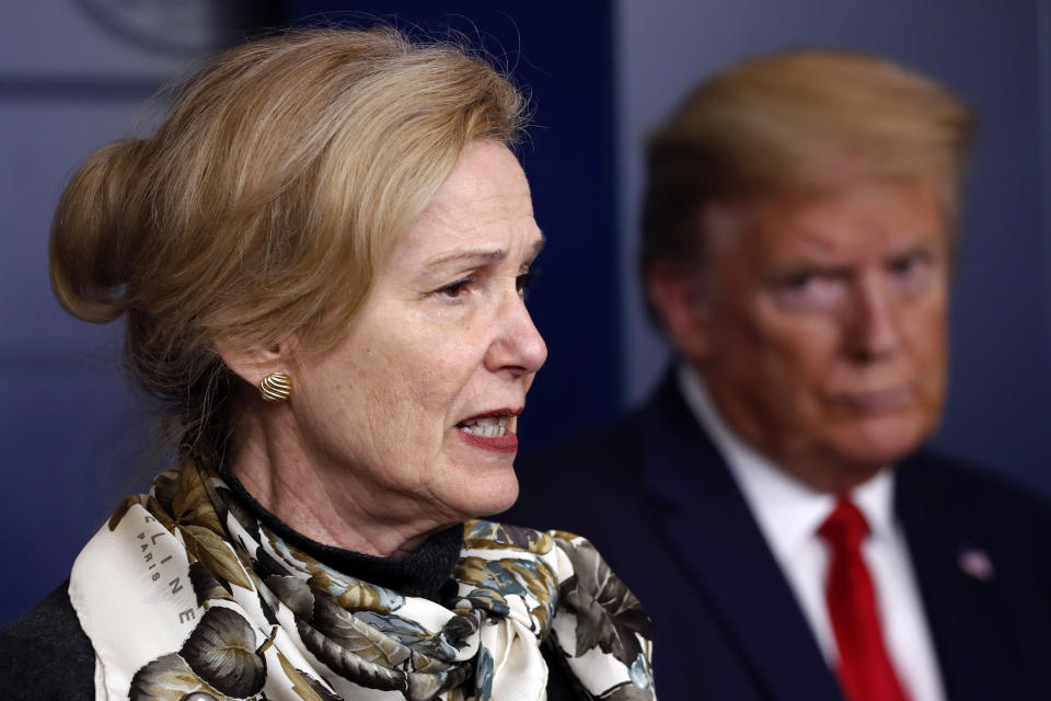 President Donald Trump listens as Dr. Deborah Birx, White House coronavirus response coordinator, speaks about the coronavirus in the James Brady Press Briefing Room of the White House, Wednesday, April 22, 2020, in Washington. (AP Photo/Alex Brandon)