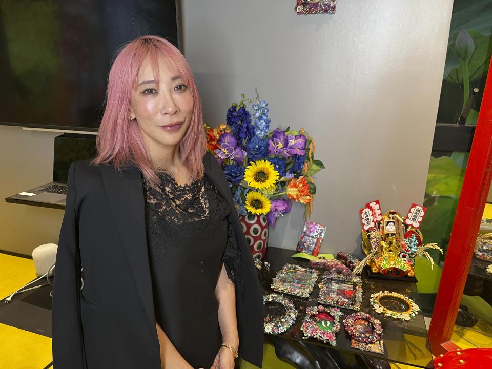 Japanese filmmaker, photographer and visual artist Mika Ninagawa speaks during an interview with The Associated Press in her office in Tokyo, Monday, Feb. 5, 2024. Her exhibition is at the Tokyo Node exhibition space in Toranomon Hills Station Tower through Feb. 25. (AP Photo/Yuri Kageyama)