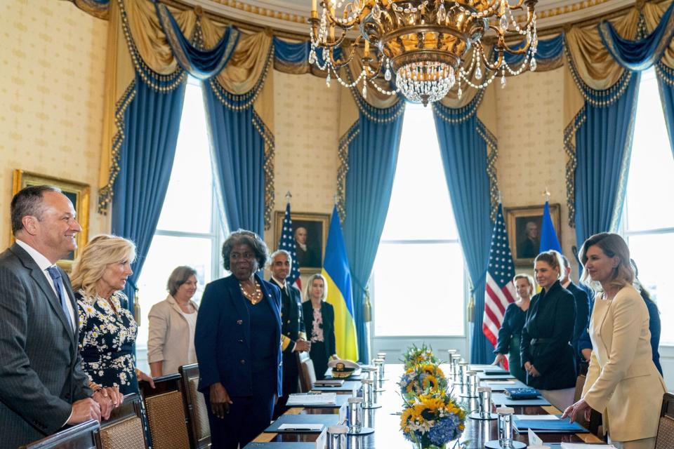 Second gentleman Doug Emhoff, left, joins first lady Jill Biden, second from left, as they greet Olena Zelenska, the first lady of Ukraine, right, before they sit down together in the Blue Room of the White House in Washington, Tuesday, July 19, 2022. Also pictured is U.S. Ambassador to the United Nations Linda Thomas-Greenfield, fourth from left, Under Secretary of State for Political Affairs Toria Nuland, third from left, and U.S. Surgeon General Vivek Murthy. (AP Photo/Andrew Harnik)