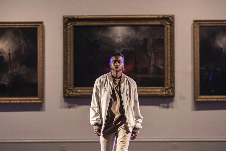 The STUZO collection is modeled during the dapperQ fashion show at the Brooklyn Museum on Thursday, Sept. 5, 2019, in New York. (AP Photo/Jeenah Moon)