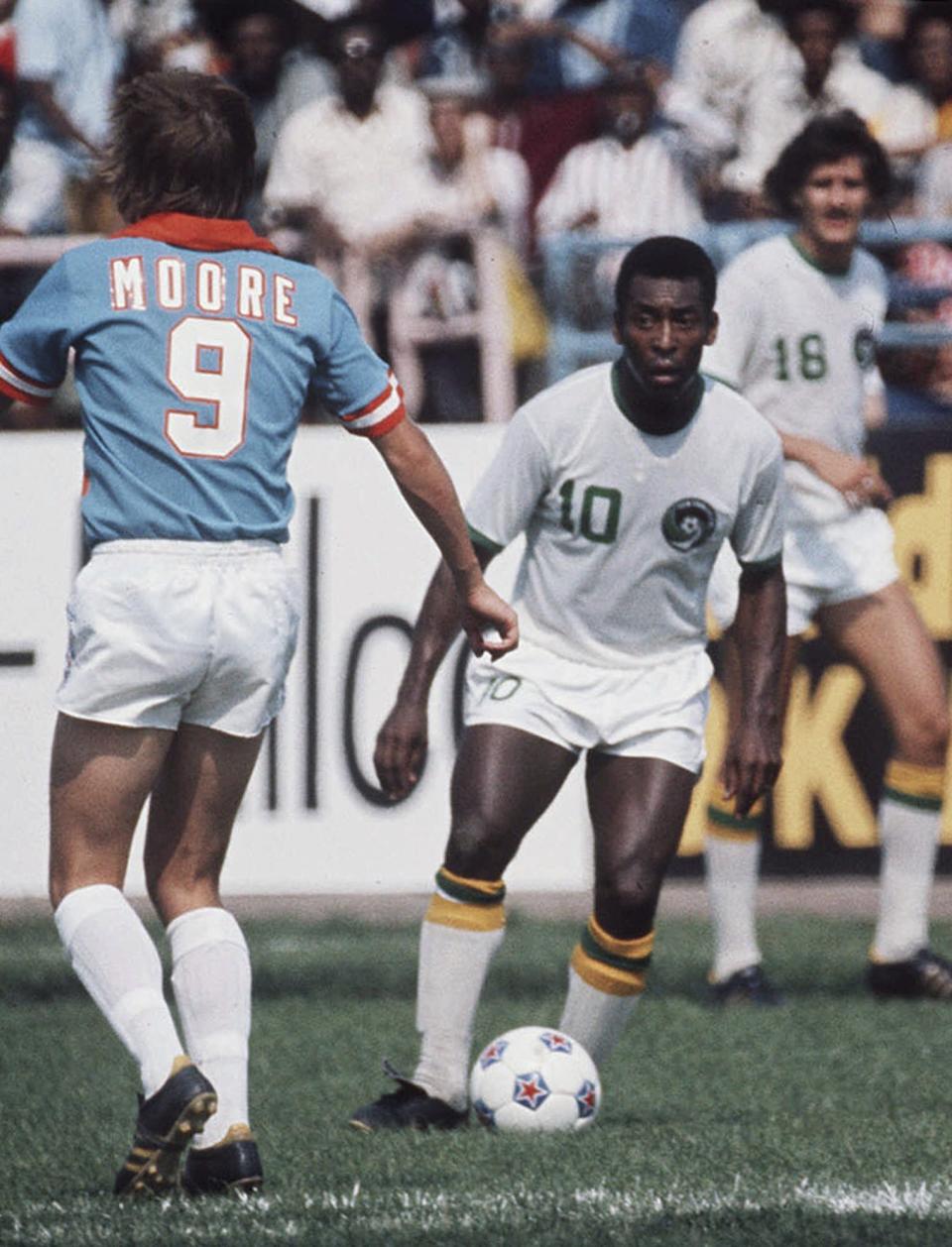 FILE - Pele of the New York Cosmos makes his professional debut with the team in an exhibition game against the Dallas Tornado in this June 15, 1975 photo at New York's Downing Stadium. Dozens of meetings over four years led to Pelé agreeing to sign with Cosmos in June 1975. His 2 1/2 seasons in New York elevated the sport, putting U.S. soccer on a path to hosting the World Cup in 1994 and launching Major League Soccer two years later. (AP Photo, File)