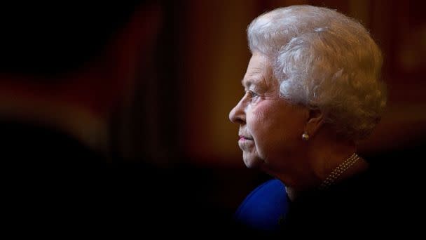 PHOTO: Britain's Queen Elizabeth tours the Foreign and Commonwealth Office during a visit to mark her Diamond Jubilee, London, December 18, 2012. (Alastair Grant/Reuters, FILE)