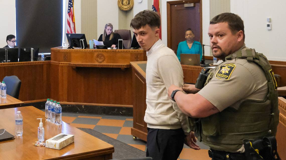 Jerron Lightfoot of Tonganoxie was led away in handcuffs Wednesday after Jackson County Judge Sarah A. Castle sentenced him to 10 years in prison for recklessly causing the February 2023 crash that killed Kansas City police officer James Muhlbauer and Jesse Eckes, a bystander caught up in the wreckage. Muhlbauer’s police dog, Champ, was also killed in the crash. Robert A. Cronkleton/bcronkleton@kcstar.com