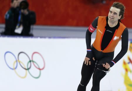 Mark Tuitert of the Netherlands reacts after the men's 1,500 metres speed skating race in the Adler Arena at the Sochi 2014 Winter Olympic Games February 15, 2014. REUTERS/Issei Kato