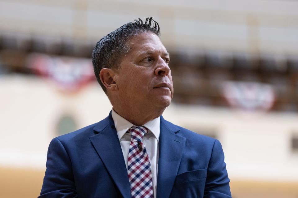 Ron Freitas, candidate for San Joaquin County District Attorney, stands while fallen soldiers are honored at the Memorial Day observance Monday, May 30, 2022, at Stockton Memorial Civic Auditorium in Stockton.