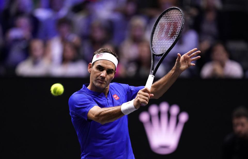 Team Europe's Roger Federer in action against Team World's Jack Sock and Frances Tiafoe on day one of the Laver Cup at the O2 Arena, London.