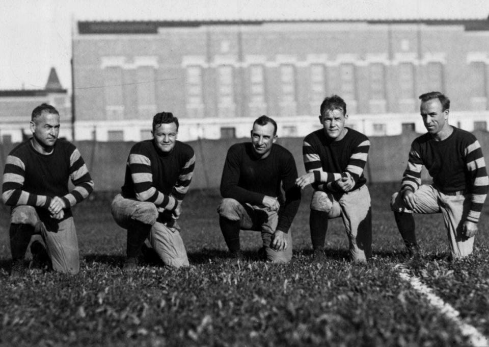 Ohio State did not put forth its best effort in 1931 against Minnesota, and coach Sam Willaman (middle) took criticism from the press about it.