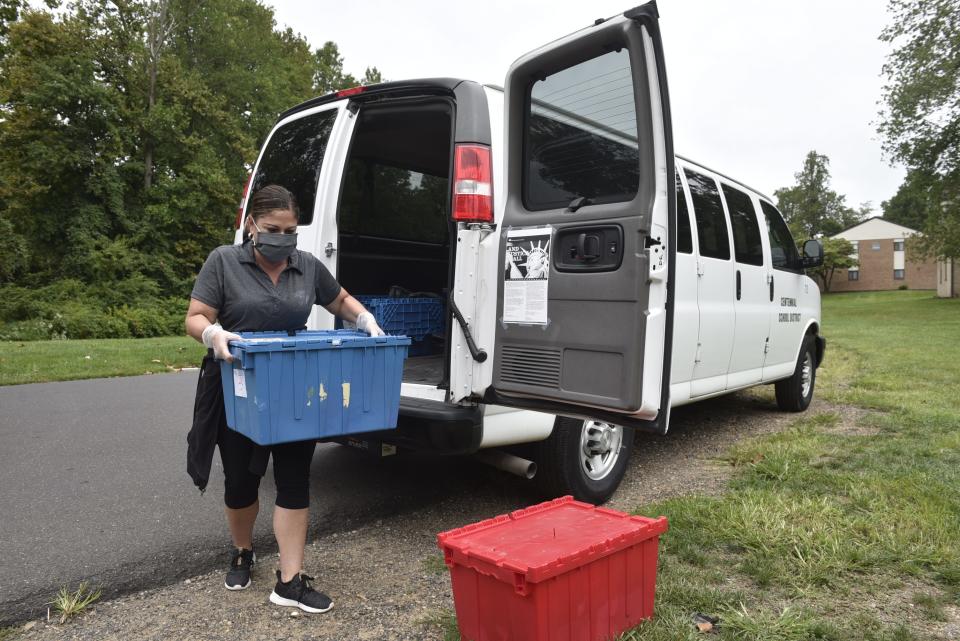 File - Centennial School District child nutrition workers prepare to hand out free breakfast and lunch in The Glen at Bucks community in Warminster. During the pandemic food service workers went the extra mile to ensure students had meals while they attended classes from home.