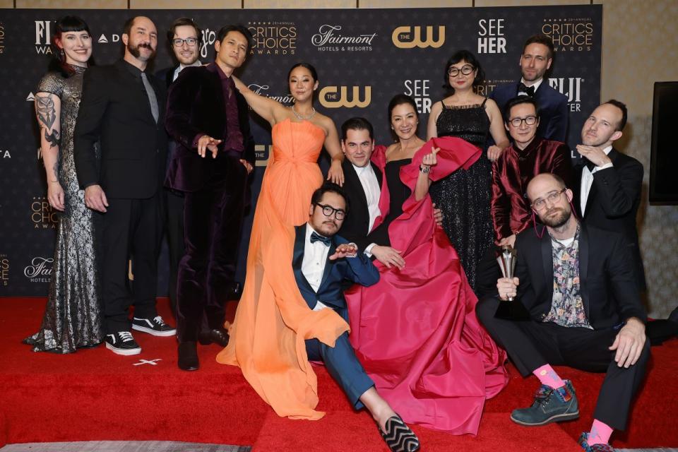 LOS ANGELES, CALIFORNIA - JANUARY 15: (L-R) Kelsi Ephraim, Jason Kisvarday, Zak Stoltz, Harry Shum Jr., Stephanie Hsu, Dan Kwan, Jonathan Wang, Michelle Yeoh, Shirley Kurata, Ke Huy Quan, Paul Rogers, Daniel Scheinert and Jon Read, winners of Best Picture award for 'Everything Everywhere All at Once', pose in the press room during the 28th Annual Critics Choice Awards at Fairmont Century Plaza on January 15, 2023 in Los Angeles, California. (Photo by Emma McIntyre/Getty Images for Critics Choice Association)