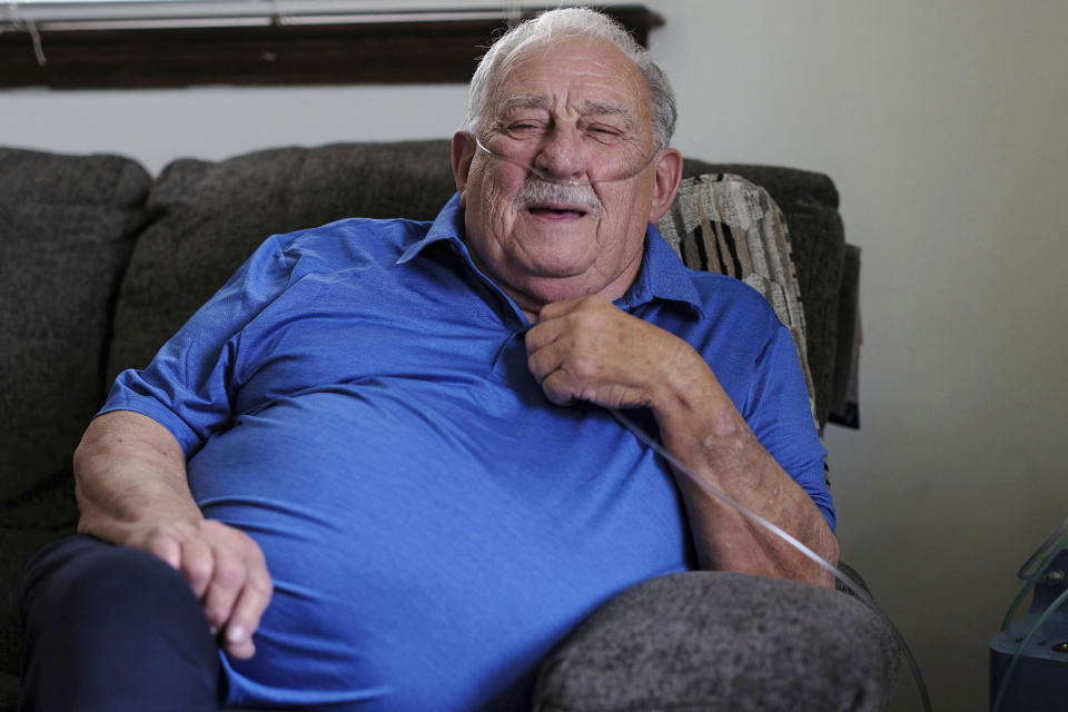 Retired coal miner James Bounds, who has pneumoconiosis, more commonly known as “black lung," poses for a photo at his home in Oak Hill, W.Va., Thursday, July, 13, 2023. Bounds said nothing can be done to reverse the debilitating illness he was diagnosed with at 37 in 1984. But he doesn't want others to suffer the same fate. (AP Photo/Chris Jackson)