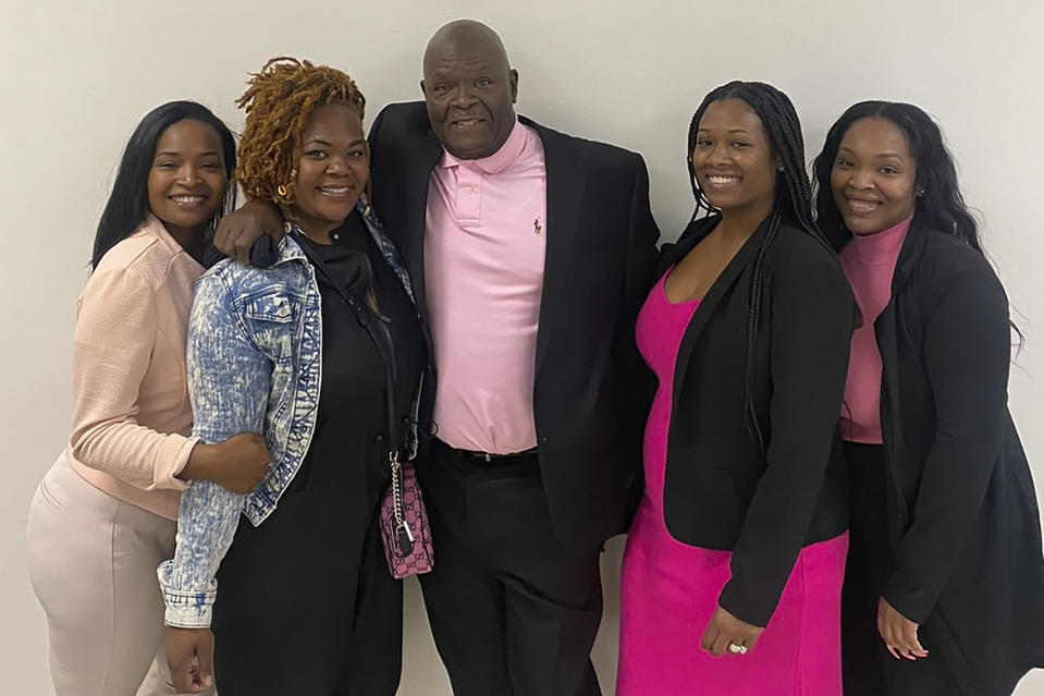 FILE - This photo provided by the family of Michael Hill in March 2023 shows, from left, Tawana Smith-Garner, Brittany Hill, Michael Hill, Shakita Dobbins and Ebony Smith. Family and friends of Michael Hill, the 61-year-old custodian killed during a shooting on Monday, March 27, at a small Christian elementary school in Nashville, gathered on Tuesday, April 4, to mourn their loss. Hundreds turned out for the funeral service at Stephens Valley Church, where pastor Jim Bachmann said the hearts of the congregation were aching for the man they called “Big Mike.” (Family photo via AP, File)