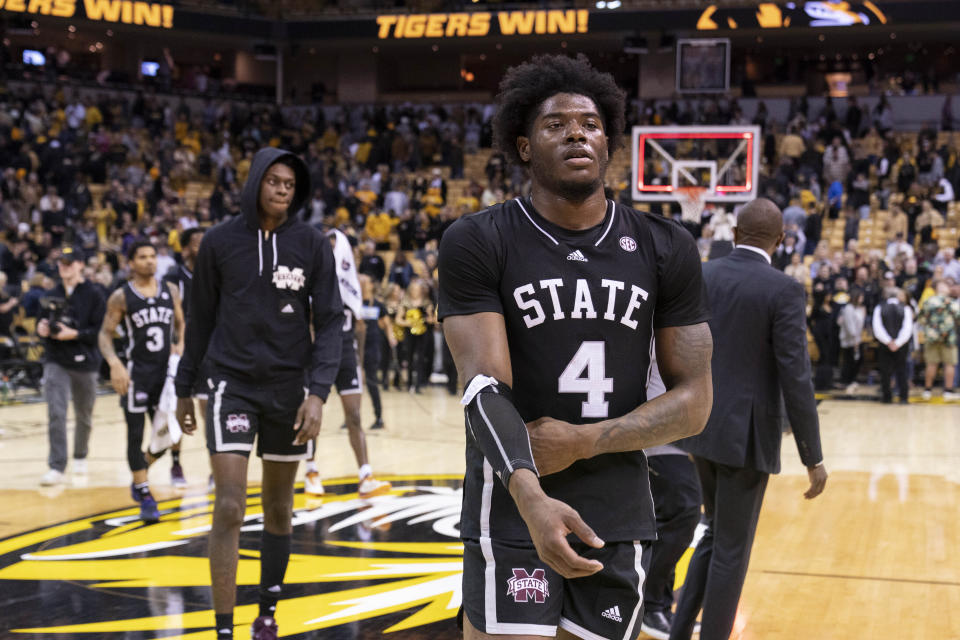 Mississippi State's Cameron Matthews, right, walks off the court after the team's loss in overtime to Missouri in an NCAA college basketball game Tuesday, Feb. 21, 2023, in Columbia, Mo. (AP Photo/L.G. Patterson)