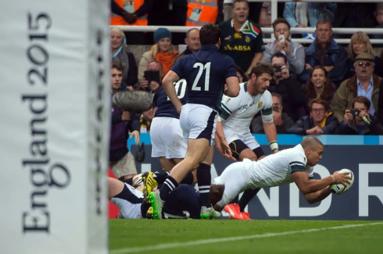 South Africa's Bryan Habana scores a try during a Pool B match in the 2015 Rugby World Cup against Scotland at St James' Park on October 3, 2015