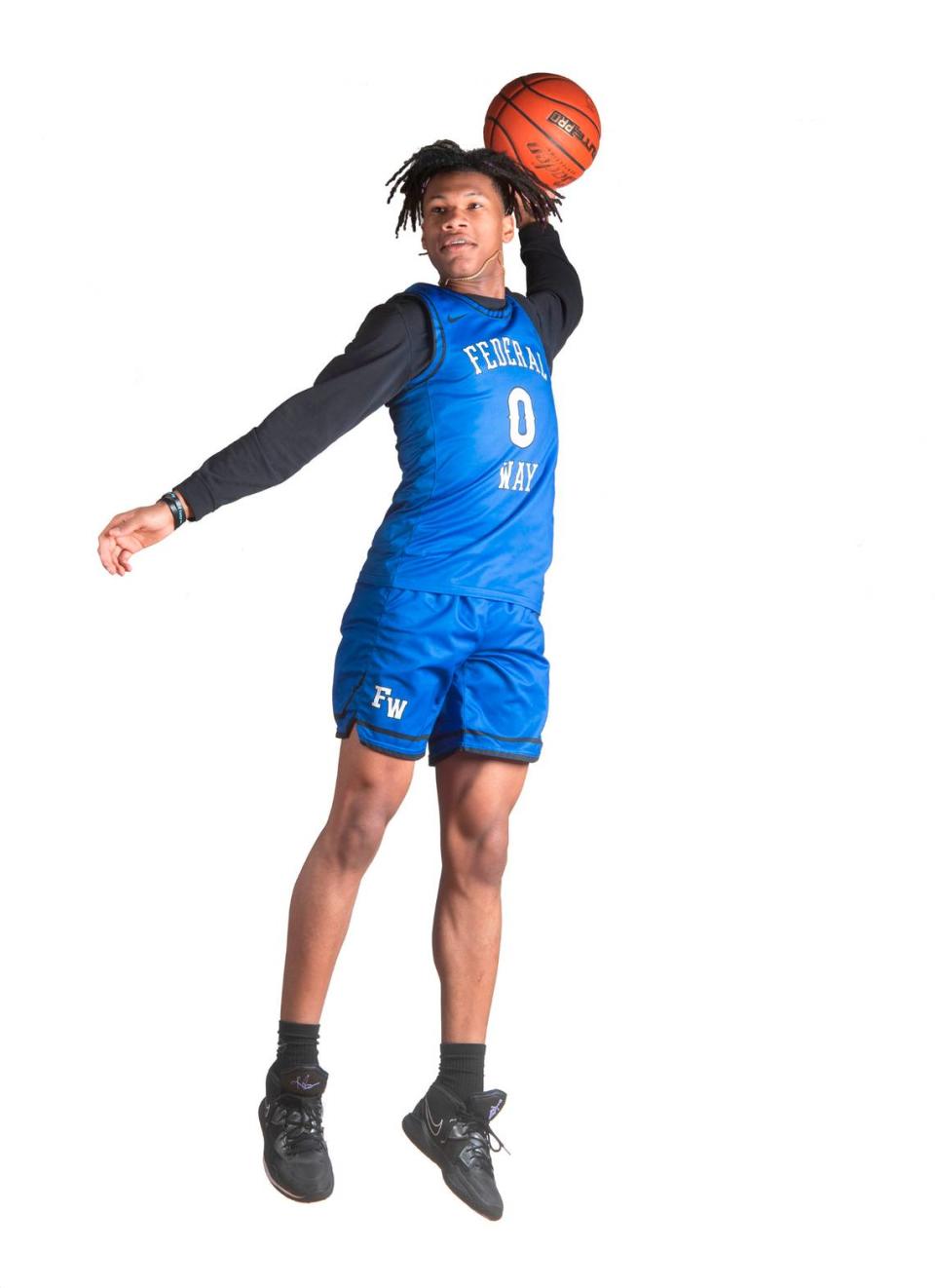Federal Way senior Vaughn Weems is one of six players named to The News Tribune’s All Area Boys Basketball Team. He is photographed at Curtis High School in University Place, Washington, on Saturday, March 11, 2023.