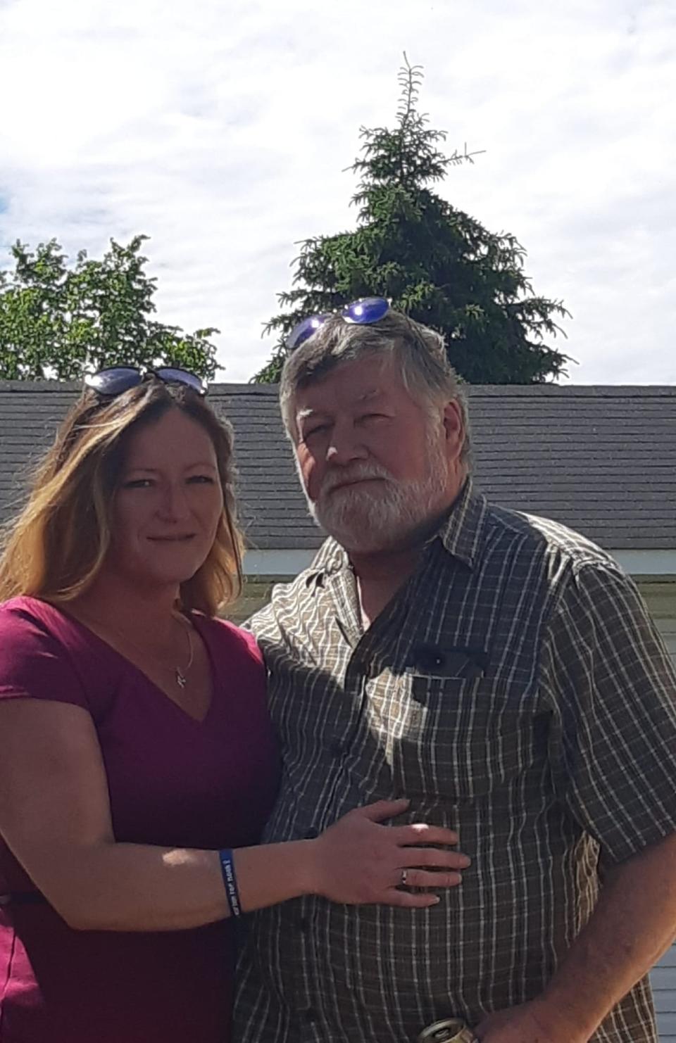 Angie Sweeney, 41, pictured with her father, Brian Sweeney, was shot and killed on Monday in a case involving intimate partner violence that has shocked people in Sault Ste. Marie, Ont. Her father described her on Facebook as someone who 'loved life and knew how to live it.' (Submitted by Brian Sweeney - image credit)