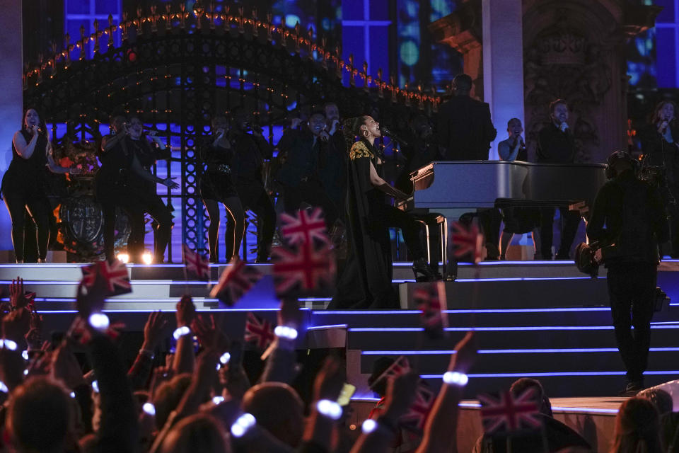 Alicia Keys performs at the Platinum Jubilee concert taking place in front of Buckingham Palace, London, Saturday June 4, 2022, on the third of four days of celebrations to mark the Platinum Jubilee. The events over a long holiday weekend in the U.K. are meant to celebrate Queen Elizabeth II's 70 years of service. (AP Photo/Alastair Grant, Pool)