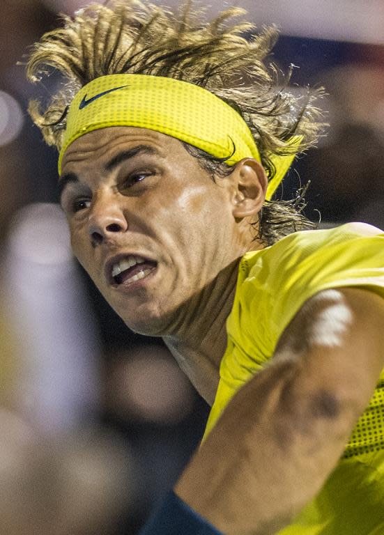 Rafael Nadal of Spain returning the ball to Novak Djokovic of Serbia during their semi-final match at the Uniprix Stadium during the ATP Rogers Cup on August 10, 2013 in Montreal, Quebec, Canada