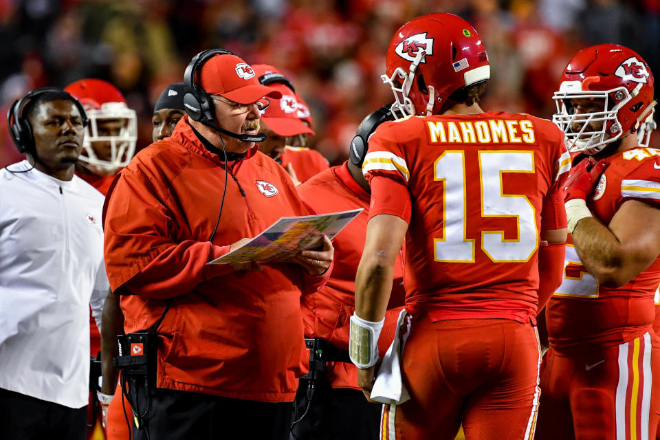 KANSAS CITY, MO – OCTOBER 21: Head coach Andy Reid of the Kansas City Chiefs talks with quarterback <a class="link " href="https://sports.yahoo.com/nfl/players/30123" data-i13n="sec:content-canvas;subsec:anchor_text;elm:context_link" data-ylk="slk:Patrick Mahomes;sec:content-canvas;subsec:anchor_text;elm:context_link;itc:0">Patrick Mahomes</a> #15 during a time out in the first half of the game against the <a class="link " href="https://sports.yahoo.com/nfl/teams/cincinnati/" data-i13n="sec:content-canvas;subsec:anchor_text;elm:context_link" data-ylk="slk:Cincinnati Bengals;sec:content-canvas;subsec:anchor_text;elm:context_link;itc:0">Cincinnati Bengals</a> at Arrowhead Stadium on October 21, 2018 in Kansas City, Kansas. (Photo by Peter Aiken/Getty Images)