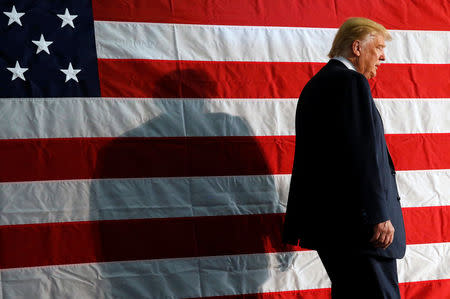 Republican presidential nominee Donald Trump takes the stage for a campaign rally in Colorado Springs, Colorado, U.S. October 18, 2016. REUTERS/Jonathan Ernst