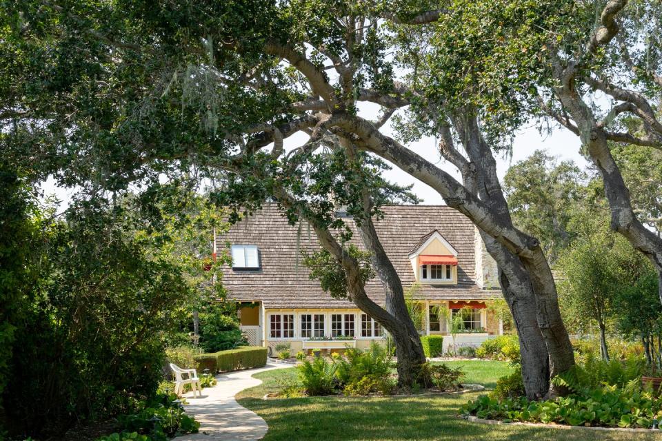 Day loved gardening, so the property is lined with oak trees, flowers, manicured lawns, and gardens.