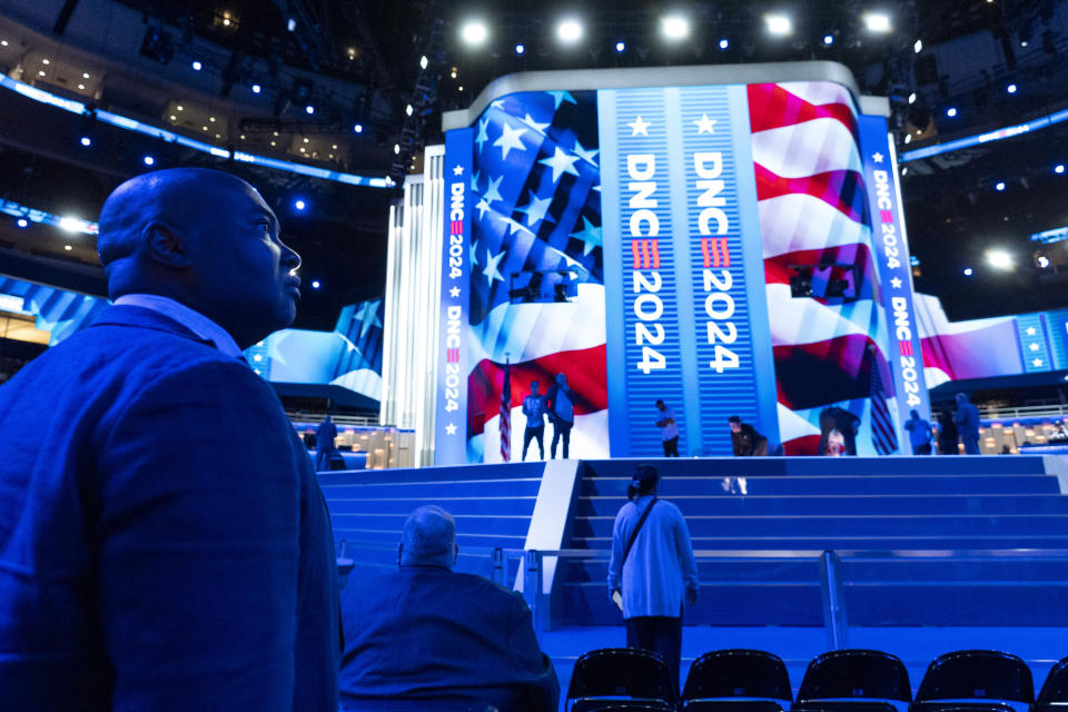 Jaime Harrison, Democratic National Committee chair, watches as preparations are made before the upcoming Democratic National Convention, Thursday, Aug. 15, 2024, in Chicago. (AP Photo/Alex Brandon)