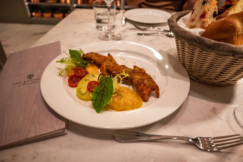 stuffed squash blossoms on plate