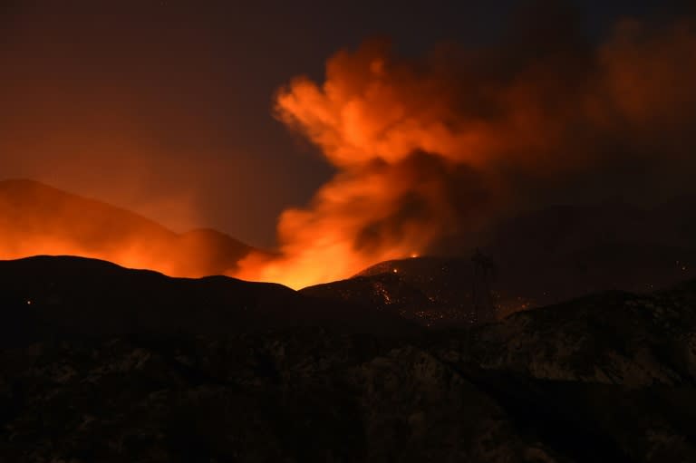 More than 34,500 homes were threatened and 82,640 people were under evacuation warnings as firenadoes -- tornado-like flaming vortexes -- rage in California