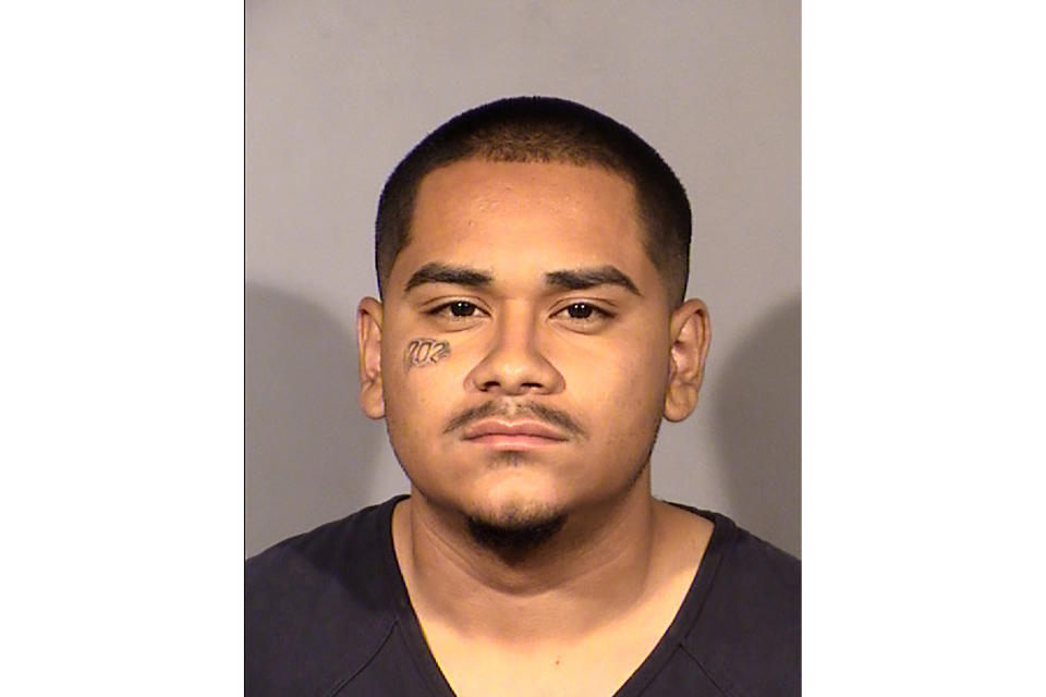This booking photo provided by Las Vegas Metropolitan Police Department shows Edgar Samaniego, 20, of Las Vegas, following his arrest Tuesday, June 2, 2020, in the shooting of Las Vegas Police Officer Shay Kellin Mikalonis late Monday on the Las Vegas Strip. The shooting happened during one of several violent clashes involving protesters and police during demonstrations over the death of George Floyd in Minneapolis. (Clark County Detention Center/Las Vegas Metropolitan Police Department via AP)