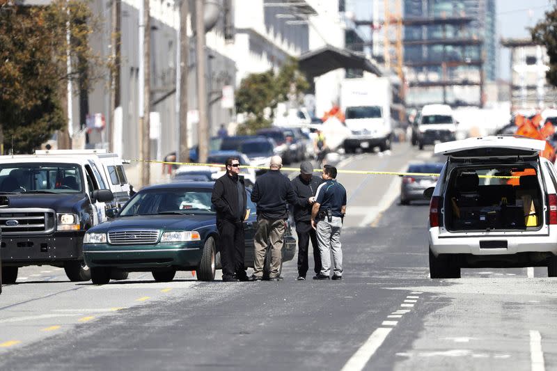 FILE PHOTO: Members of the San Francisco Police department are seen at the scene of a hit-and-run incident after a vehicle struck five pedestrians, killing one in San Francisco