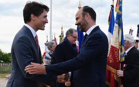 French Prime Minister Edouard Philippe (R) shakes hands with Canadian Prime Minister Justin Trudeau - Credit: FRED TANNEAU/POOL/EPA-EFE/REX