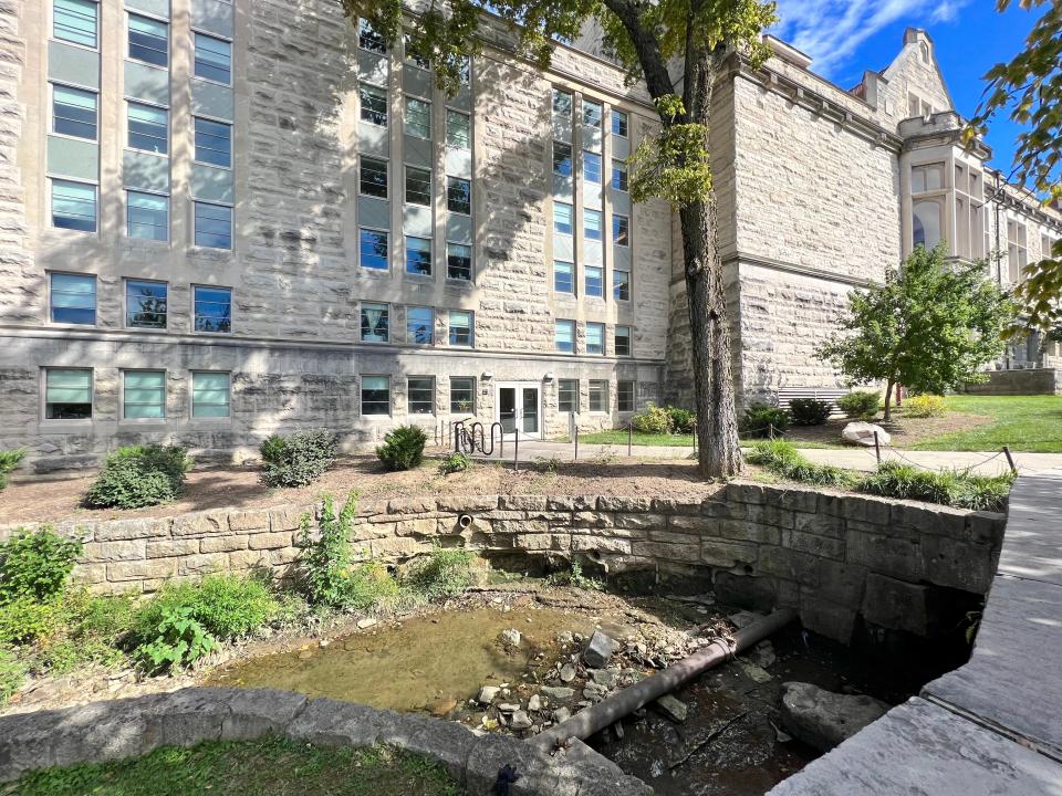 A campus creek tumbles into a storm drain at Indiana University. But one one day, police were searching for an armed man inside the drain.