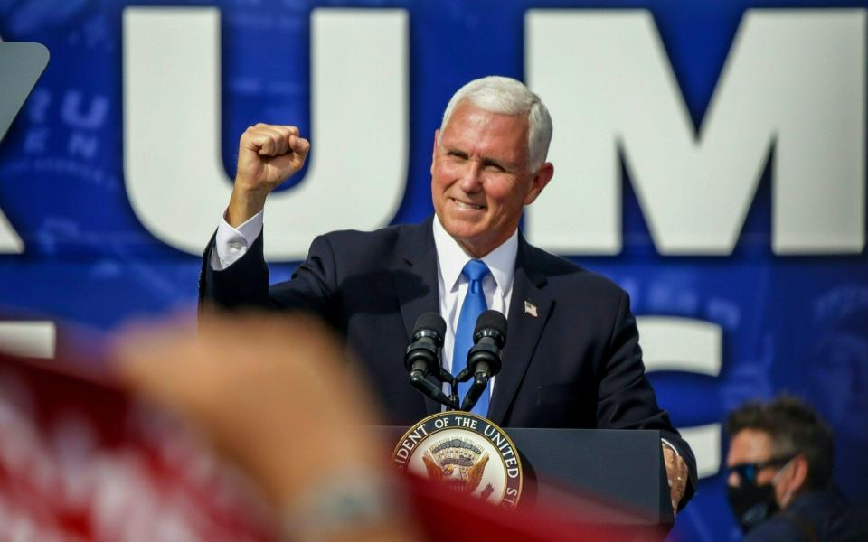 “It’s great to be back in the Sunshine State, it’s great to be back in Trump country,” Mr Pence said as he took to the stage in Brownwood Paddock Square.  - AFP