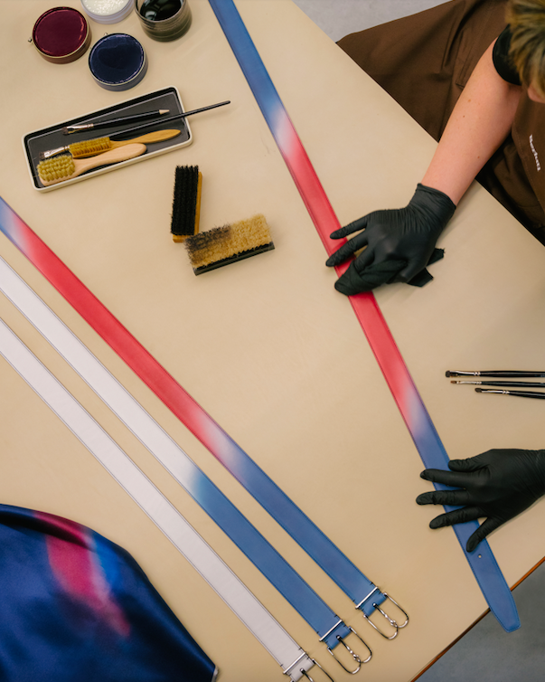 An artisan working on the Berluti belts.