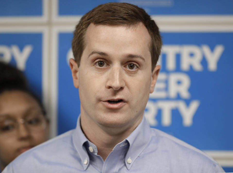 FILE - In this May 15, 2019, file photo, Ninth Congressional district Democratic candidate Dan McCready answers a question during a news conference in Charlotte, N.C. The North Carolina Democrat in a U.S. House special election plans to propose broadly increasing national service programs to better tie the country together. McCready makes his pitch Wednesday, July 17, 2019 in suburban Charlotte alongside retired U.S. Army four-star general Stanley McChrystal. (AP Photo/Chuck Burton, File)