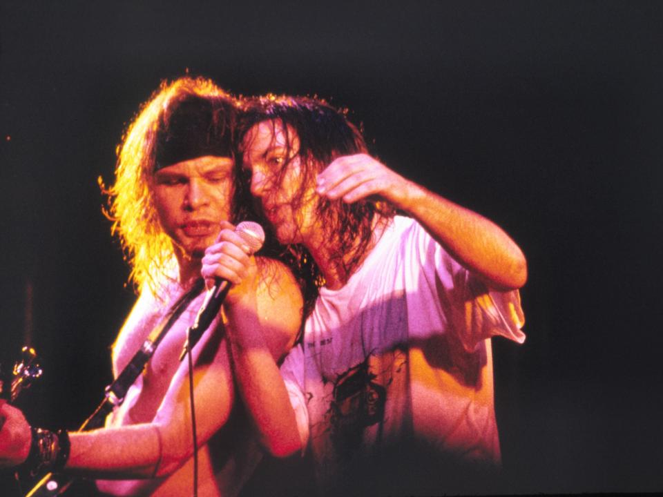 <p>Pearl Jam’s Eddie Vedder (right) and bassist Jeff Ament at London’s Brixton Academy, July 1993</p>Rex