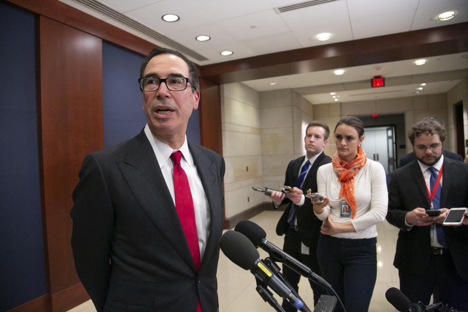 Treasury Secretary Steven Mnuchin speaks to reporters after giving a classified briefing to members of the House of Representatives, telling them that the Trump administration will keep strict U.S. sanctions on the Russian oligarch Oleg Deripaska, on Capitol Hill in Washington, Thursday, Jan. 10, 2019. (AP Photo/J. Scott Applewhite)