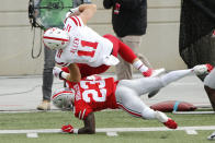 Ohio State defensive back Marcus Hooker, bottom, tackles Nebraska tight end Austin Allen during the first half of an NCAA college football game Saturday, Oct. 24, 2020, in Columbus, Ohio. (AP Photo/Jay LaPrete)