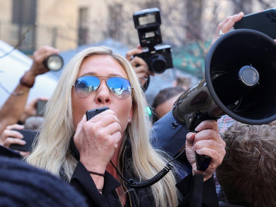 U.S. Rep. Marjorie Taylor Greene (R-GA) speaks outside Manhattan Criminal Courthouse on the day of former U.S. President Donald Trump's planned court appearance (REUTERS)