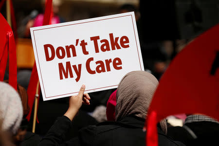 Activists protest against the Republican plan to repeal Obamacare during a rally in Freedom Plaza in Washington March 23, 2017. REUTERS/Kevin Lamarque