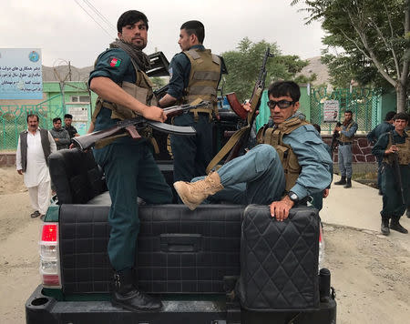 Afghan policemen arrive at the site of blasts in Kabul, Afghanistan June 3, 2017. REUTERS/Mohammad Ismail