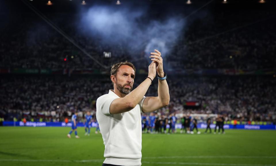 <span>Gareth Southgate reacts after England’s goalless against Slovenia in a Euro 2024 group stage match in Cologne on 25 June.</span><span>Photograph: Ryan Pierse/UEFA/Getty Images</span>