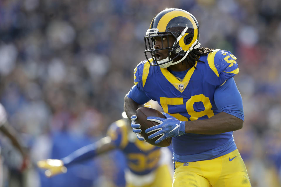 Los Angeles Rams inside linebacker Cory Littleton scores on a interception against the San Francisco 49ers during the first half in an NFL football game Sunday, Dec. 30, 2018, in Los Angeles. (AP Photo/Marcio Jose Sanchez)