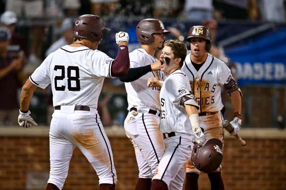 Jun 10, 2022; College Station, TX, USA; Texas A&M outfielder Jordan Thompson (31) celebrates after hitting a two run home run in the top of the seventh against the Louisville Mandatory Credit: Maria Lysaker-USA TODAY Sports