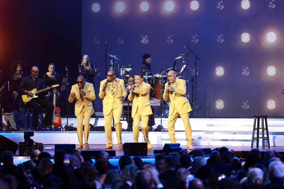 From left-to-right, Four Tops members Lawrence Payton, Alexaner Morris, Ronnie Mcneir and Abdul ‘Duke’ Fakir perform on stage. Morris says he was put in a restraining device after telling hospital staff he is a member of the group (Getty Images for The Recording A)