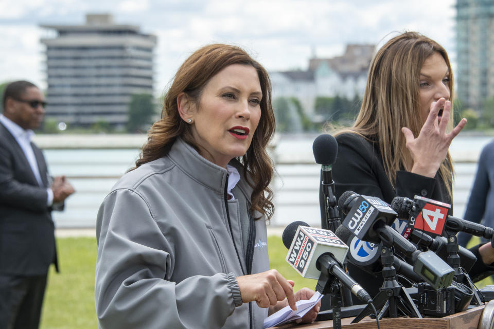 Michigan Gov. Gretchen Whitmer speaks during a press conference on Belle Isle in Detroit, on Tuesday, June 22, 2021, announcing the end of COVID restrictions in the state. After facing 15 months of capacity restrictions and being hit by the country’s worst surge of coronavirus infections this spring, restaurants, entertainment businesses and other venues can operate at 100% occupancy starting Tuesday. (David Guralnick/Detroit News via AP)