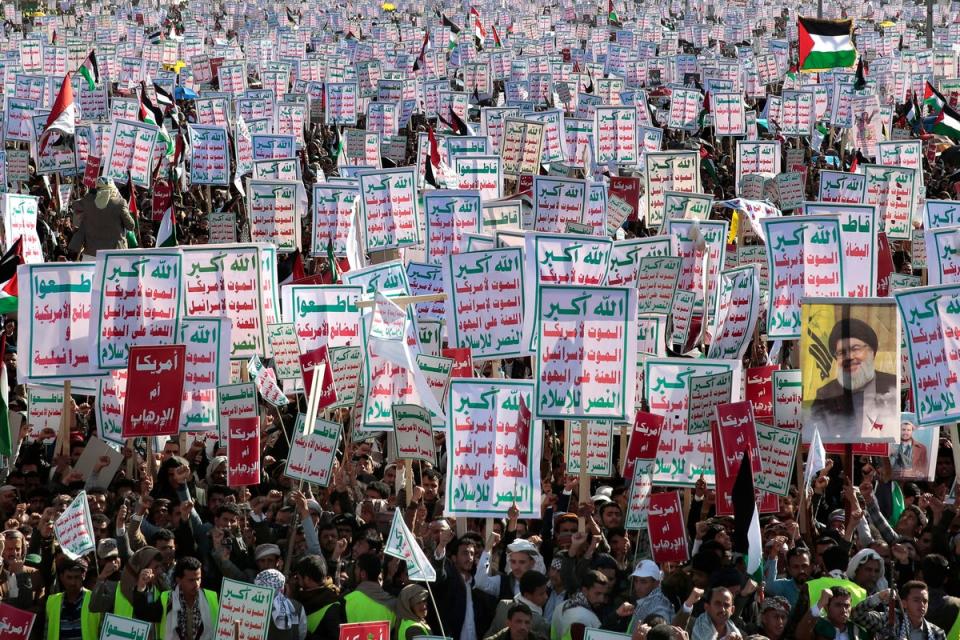 Houthi supporters attend a rally in support of the Palestinians in the Gaza Strip and against the US-led airstrikes on Yemen (AP)