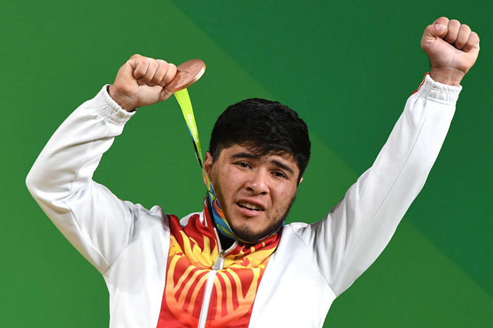 Kyrgyzstan's Izzat Artykov was stripped of his bronze weightlifting medal by the IOC. (Getty Images)