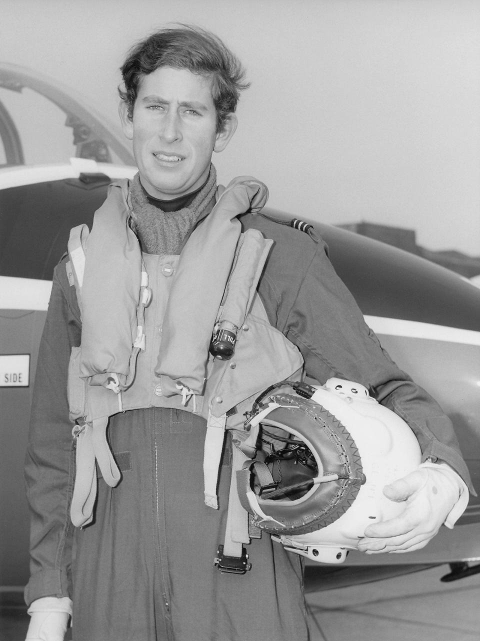 In this handout file photo made available by the Royal Air Force on January 3, 2008, HRH Prince Charles, Prince of Wales is pictured at the end of his first circuit consolidation exercise on April 3, 1971. His son Prince William will follow in his footsteps and learn to fly at The Royal Air Force College from January 2008 in Cranwell, England.